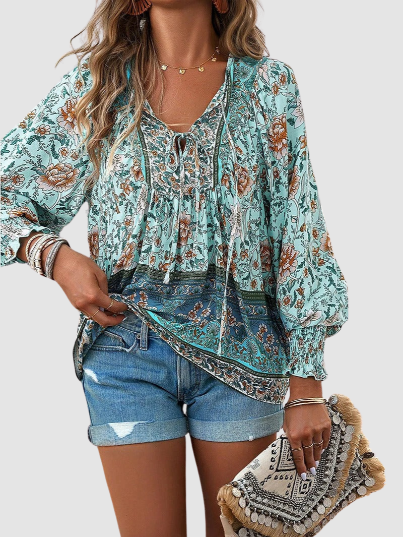 MARGARIDA | Blusa com estampado floral e punhos franzidos