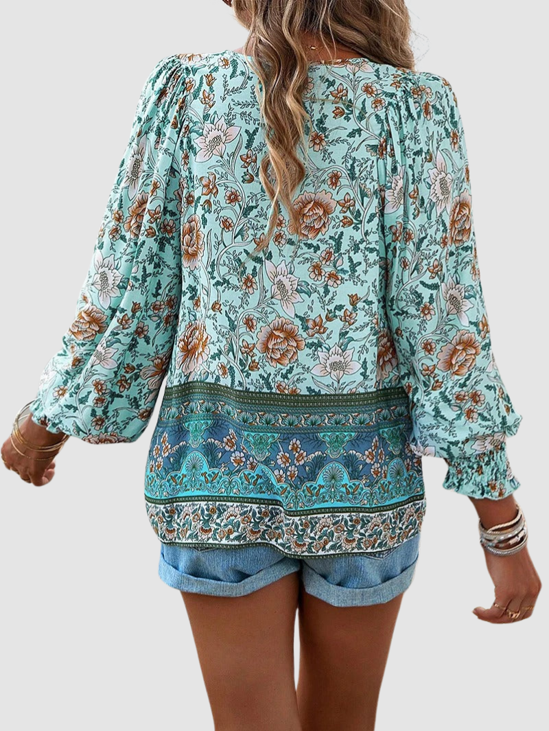 MARGARIDA | Blusa com estampado floral e punhos franzidos