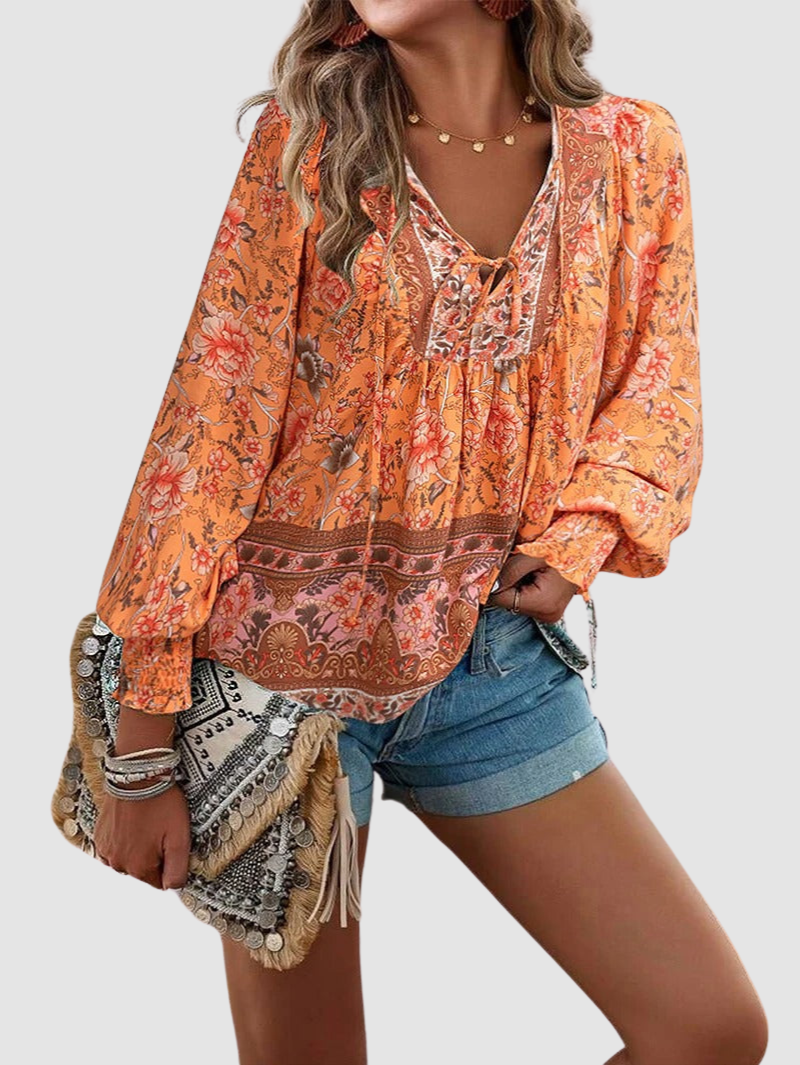 MARGARIDA | Blusa com estampado floral e punhos franzidos