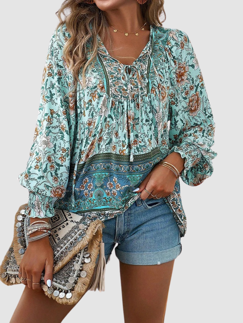 MARGARIDA | Blusa com estampado floral e punhos franzidos