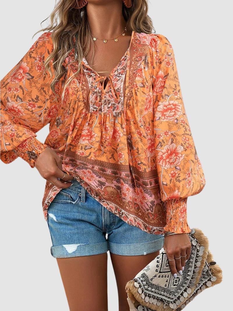 MARGARIDA | Blusa com estampado floral e punhos franzidos