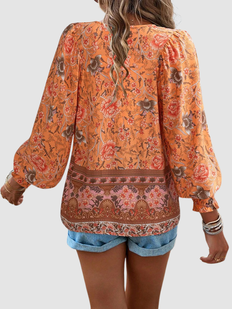 MARGARIDA | Blusa com estampado floral e punhos franzidos