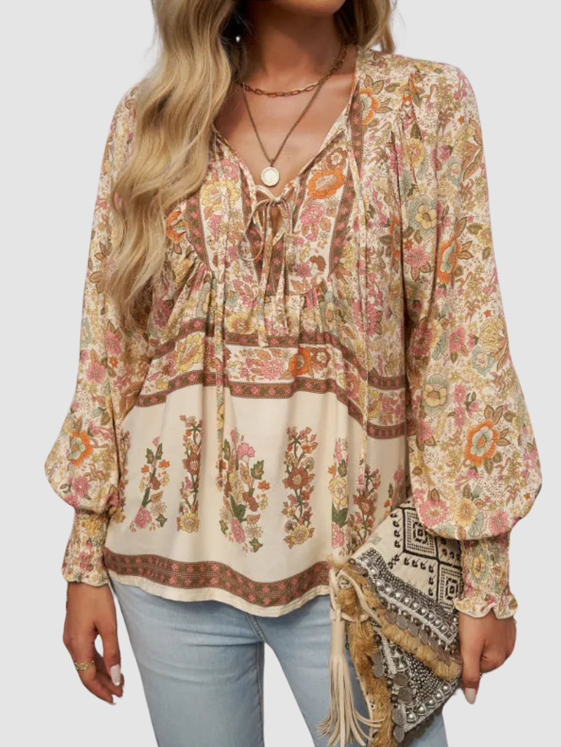 MARGARIDA | Blusa com estampado floral e punhos franzidos