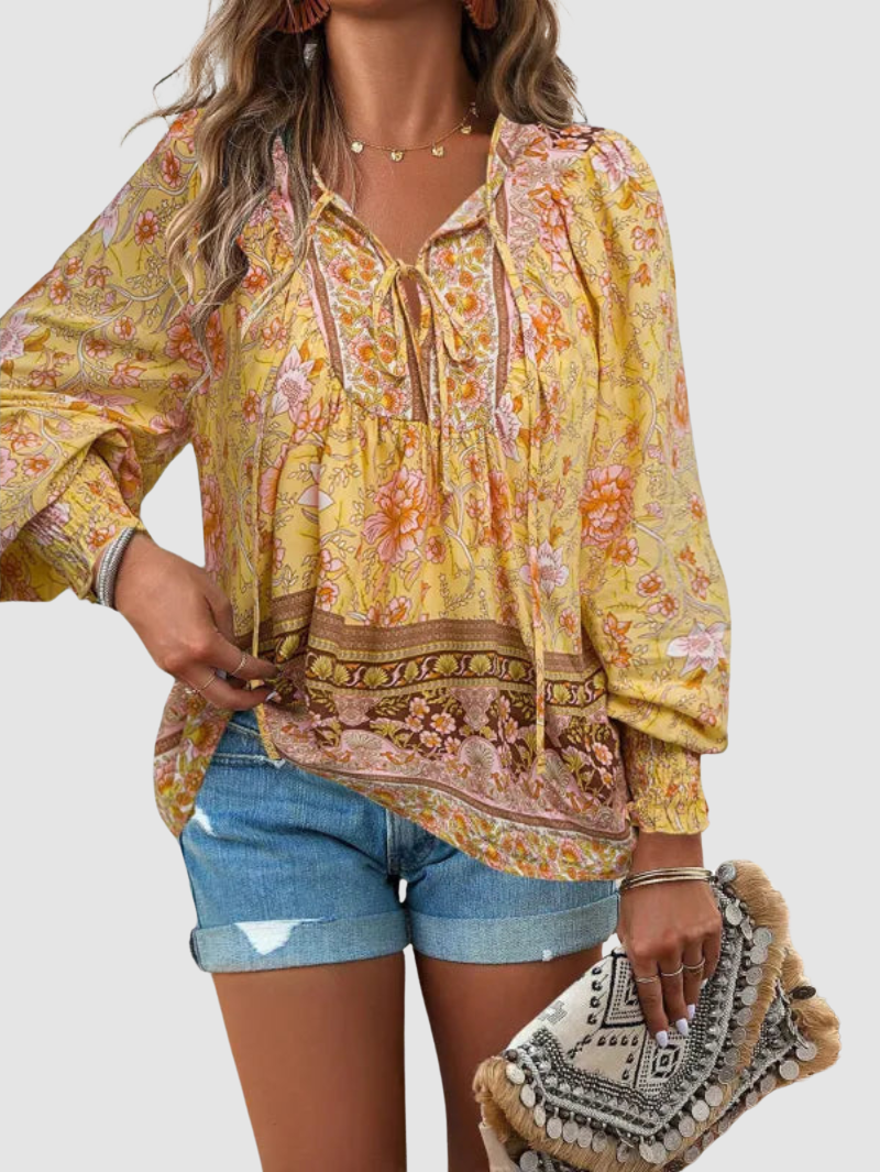 MARGARIDA | Blusa com estampado floral e punhos franzidos